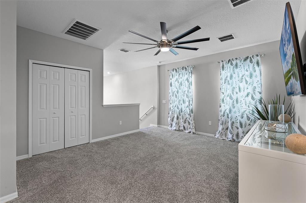 2286 Huntsman Rdg Road Minneola, FL 34715 - Photo 18 of 35 a view of an empty room with window and cabinet