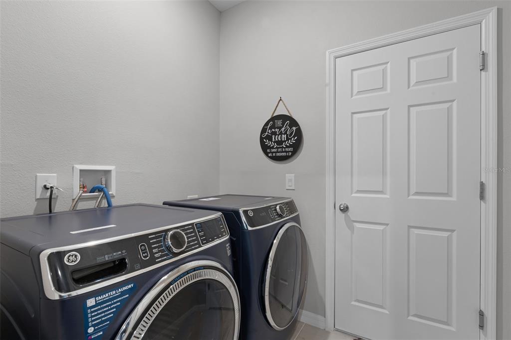 2286 Huntsman Rdg Road Minneola, FL 34715 - Photo 27 of 35 a utility room with dryer and washer