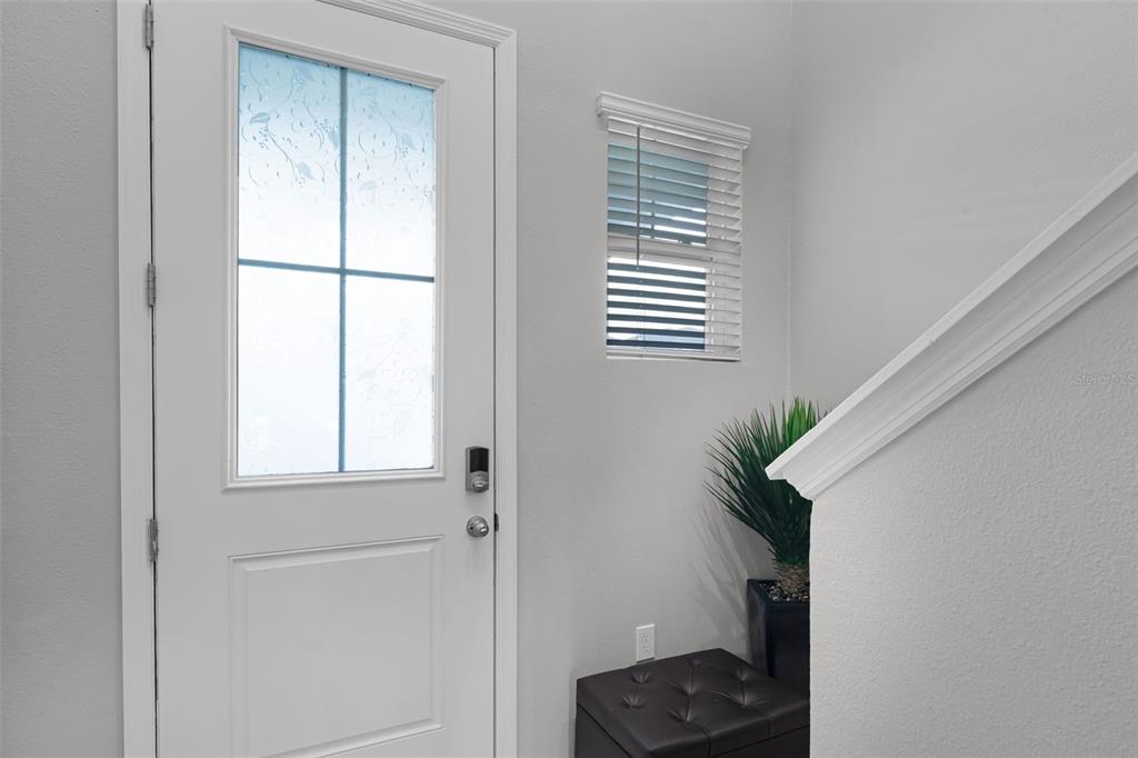 2286 Huntsman Rdg Road Minneola, FL 34715 - Photo 5 of 35 a view of hallway with small closet and a window