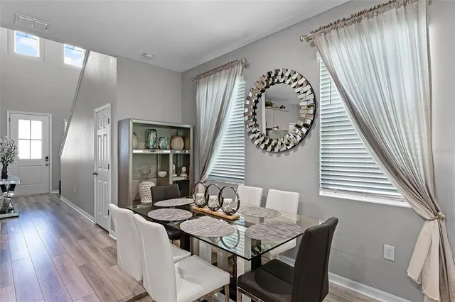a view of a livingroom with furniture and window