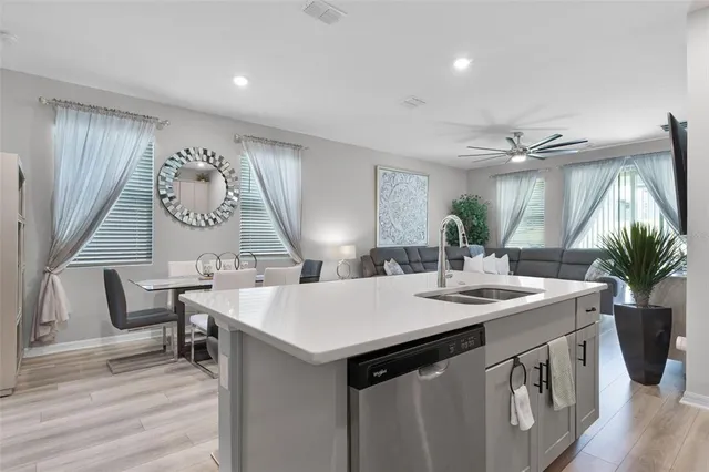 a kitchen with a table and chairs