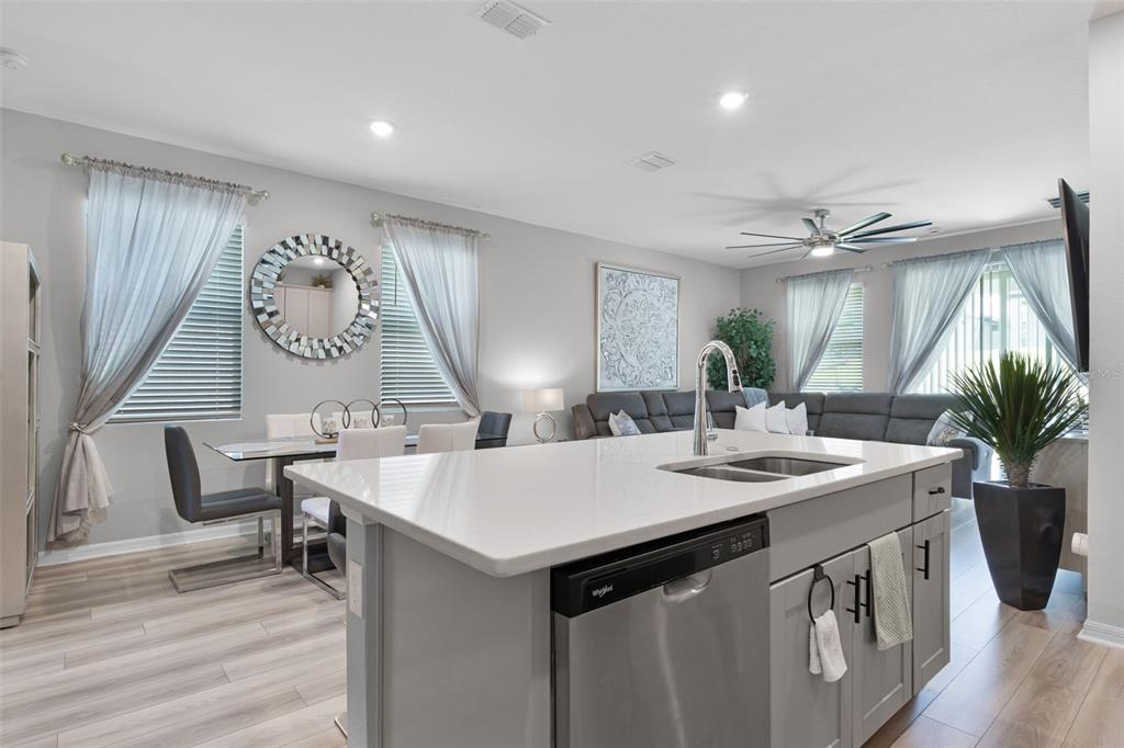 2286 Huntsman Rdg Road Minneola, FL 34715 - Photo 9 of 35 a kitchen with a table and chairs