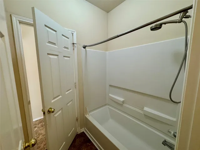 a bathroom with a sink and a shower