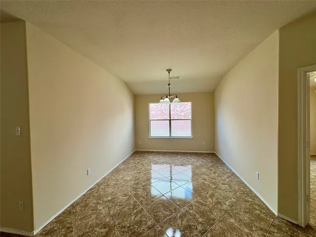 a view of a room with a window