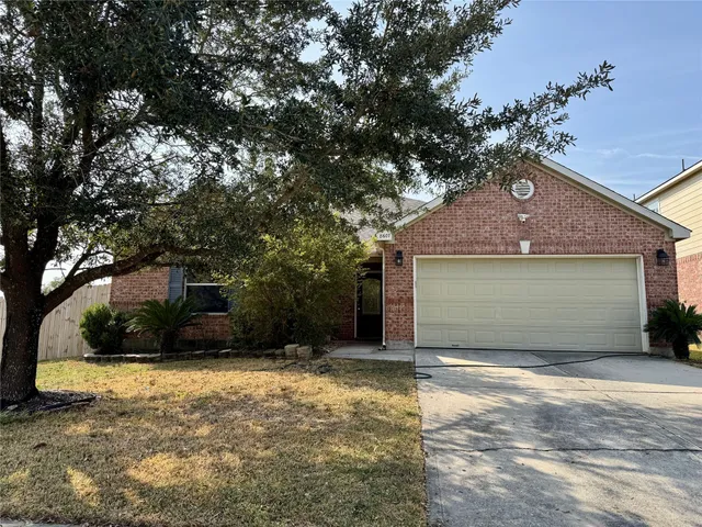 a front view of house with garage