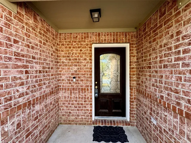 a front view of a house with a door