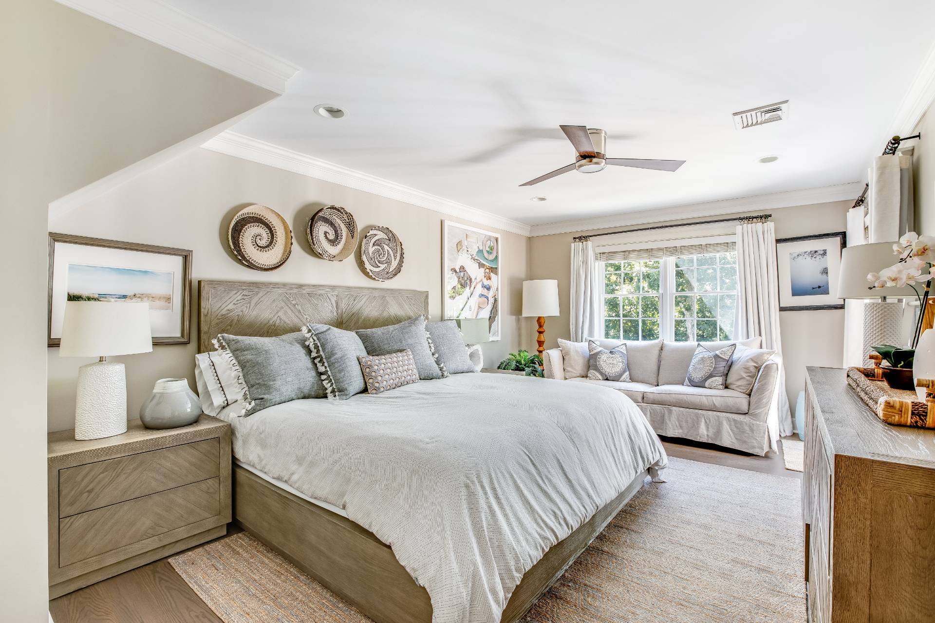 21 Tara Road Montauk, NY 11954 - Photo 14 of 37 a bedroom with a bed and a couch