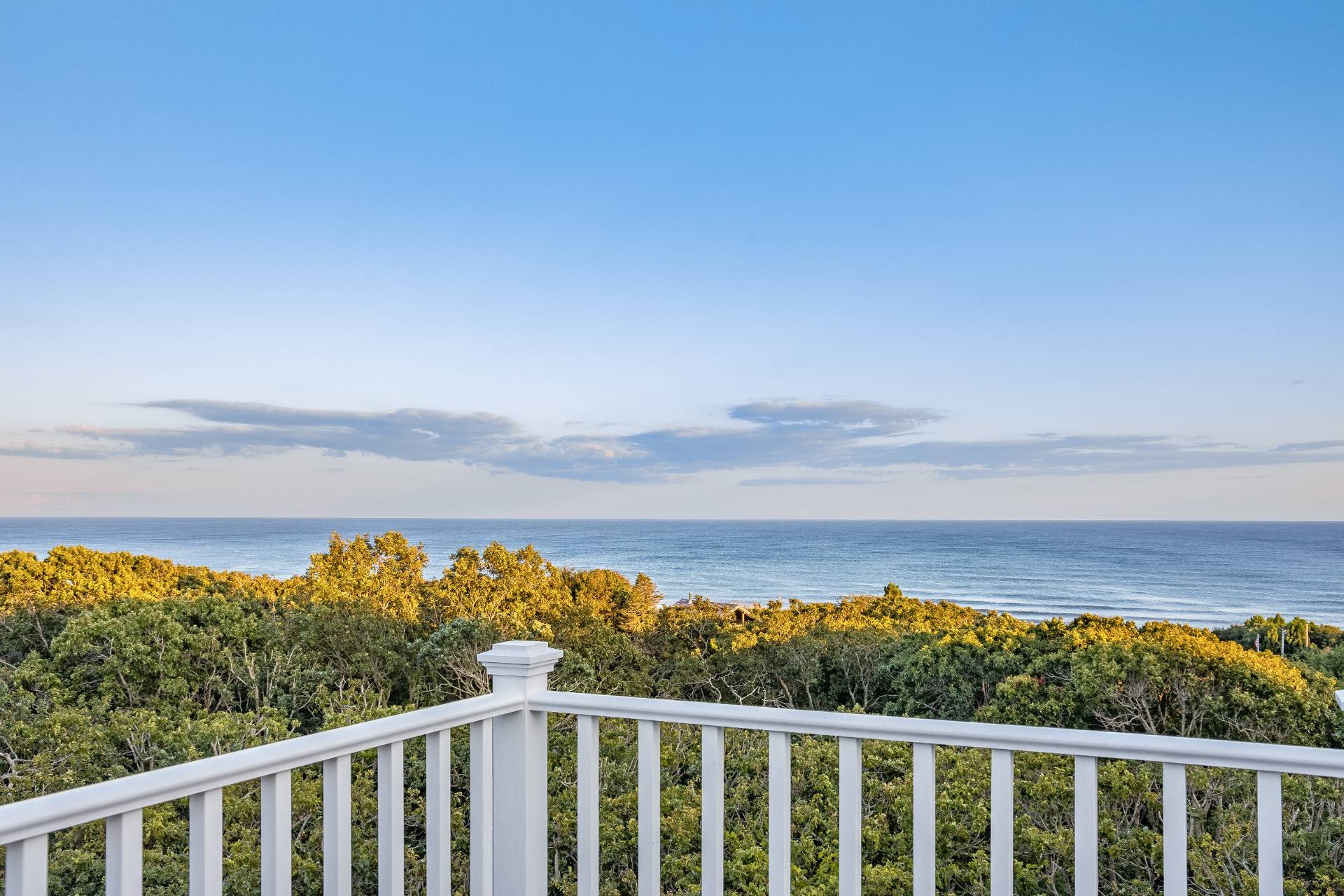 21 Tara Road Montauk, NY 11954 - Photo 2 of 37 a view of a balcony with an ocean view