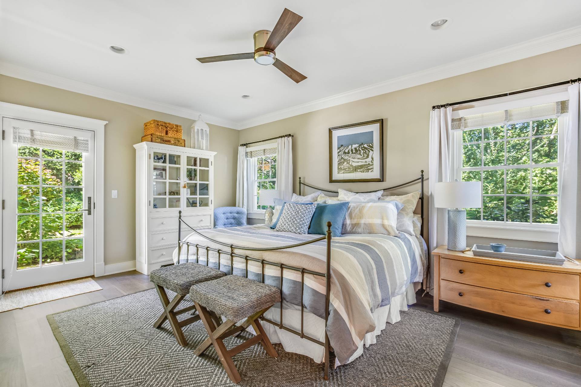 21 Tara Road Montauk, NY 11954 - Photo 26 of 37 a bedroom with a bed and a window