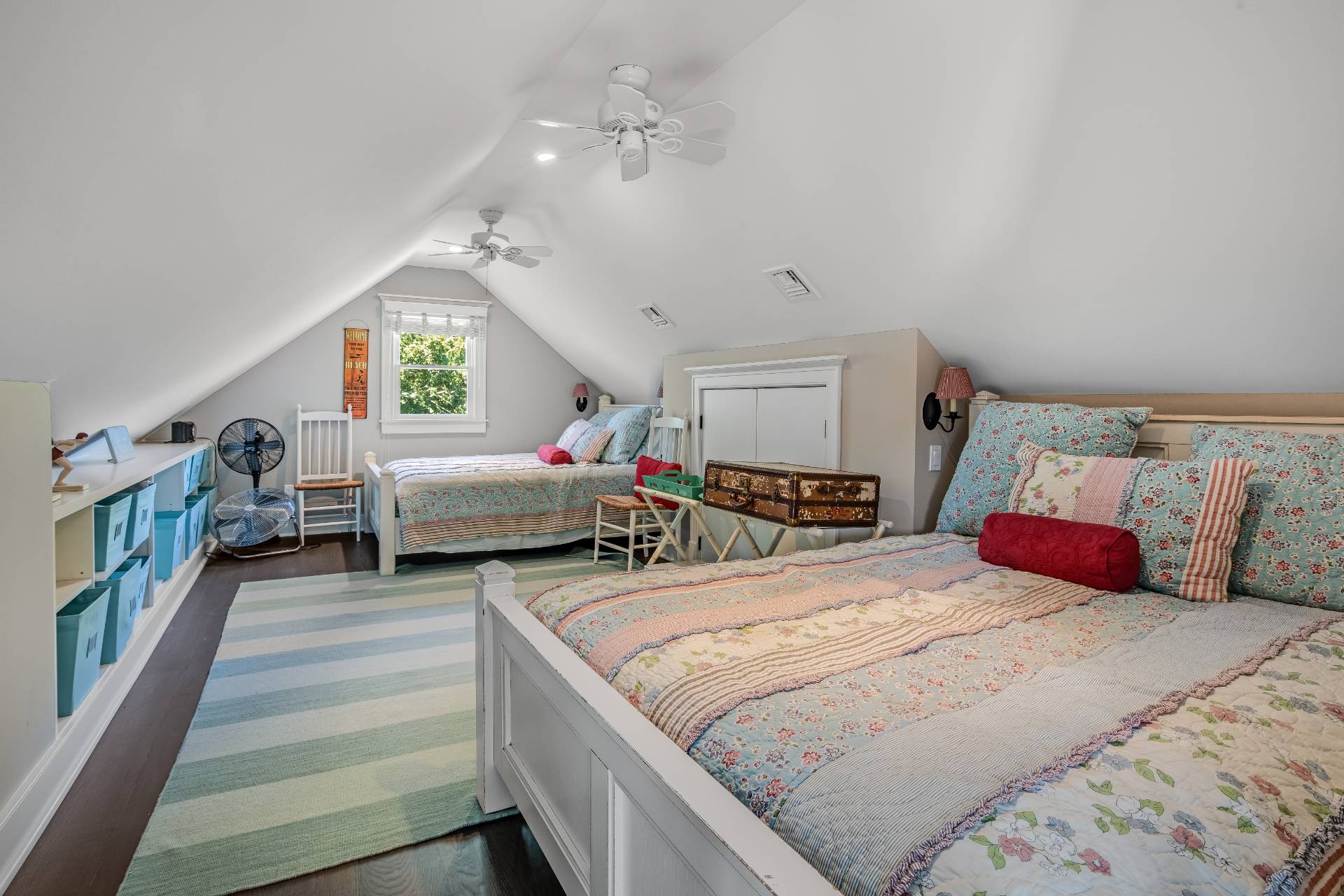 21 Tara Road Montauk, NY 11954 - Photo 27 of 37 a bedroom with bed and a window
