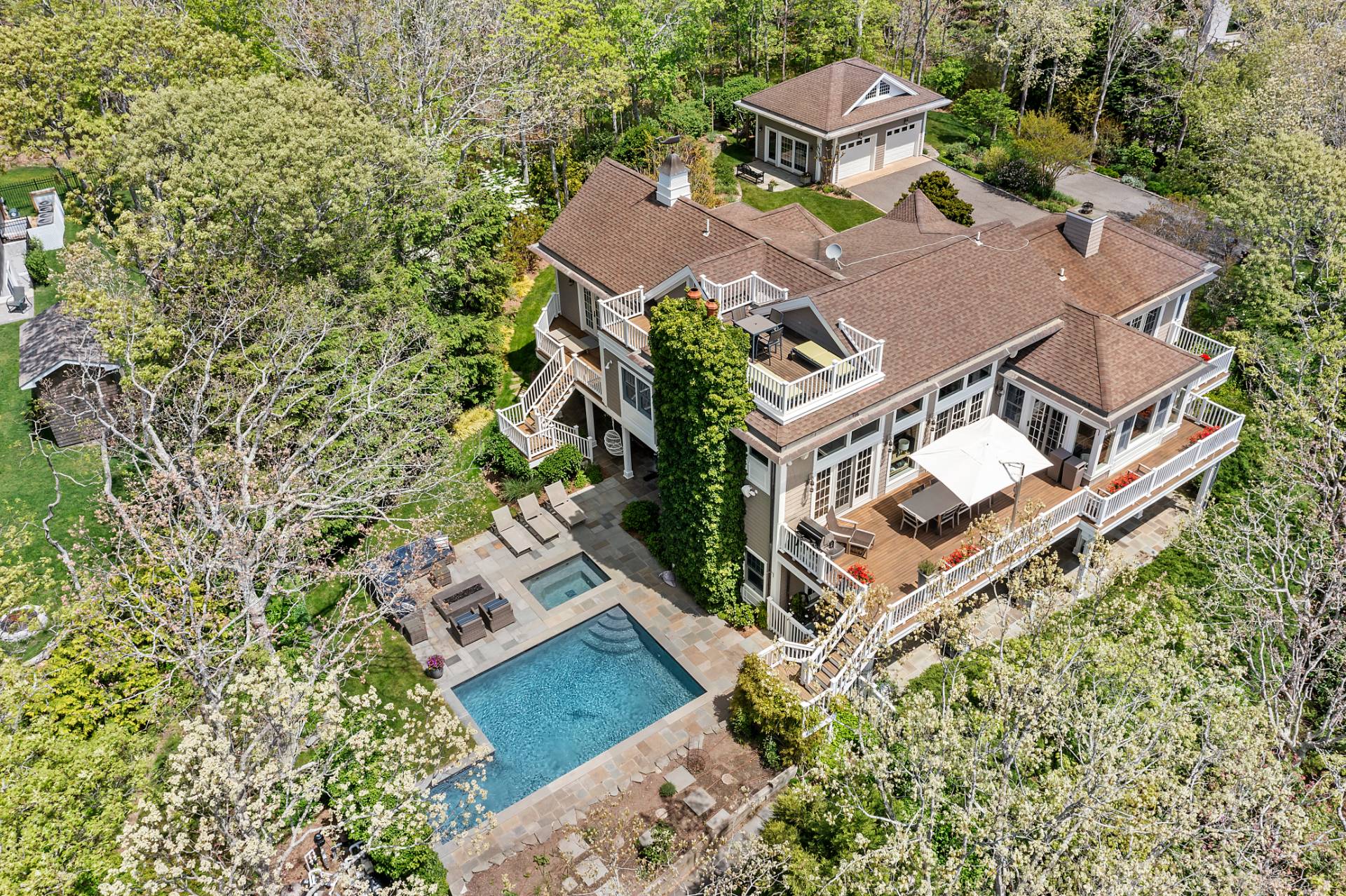 21 Tara Road Montauk, NY 11954 - Photo 34 of 37 an aerial view of a house with a garden