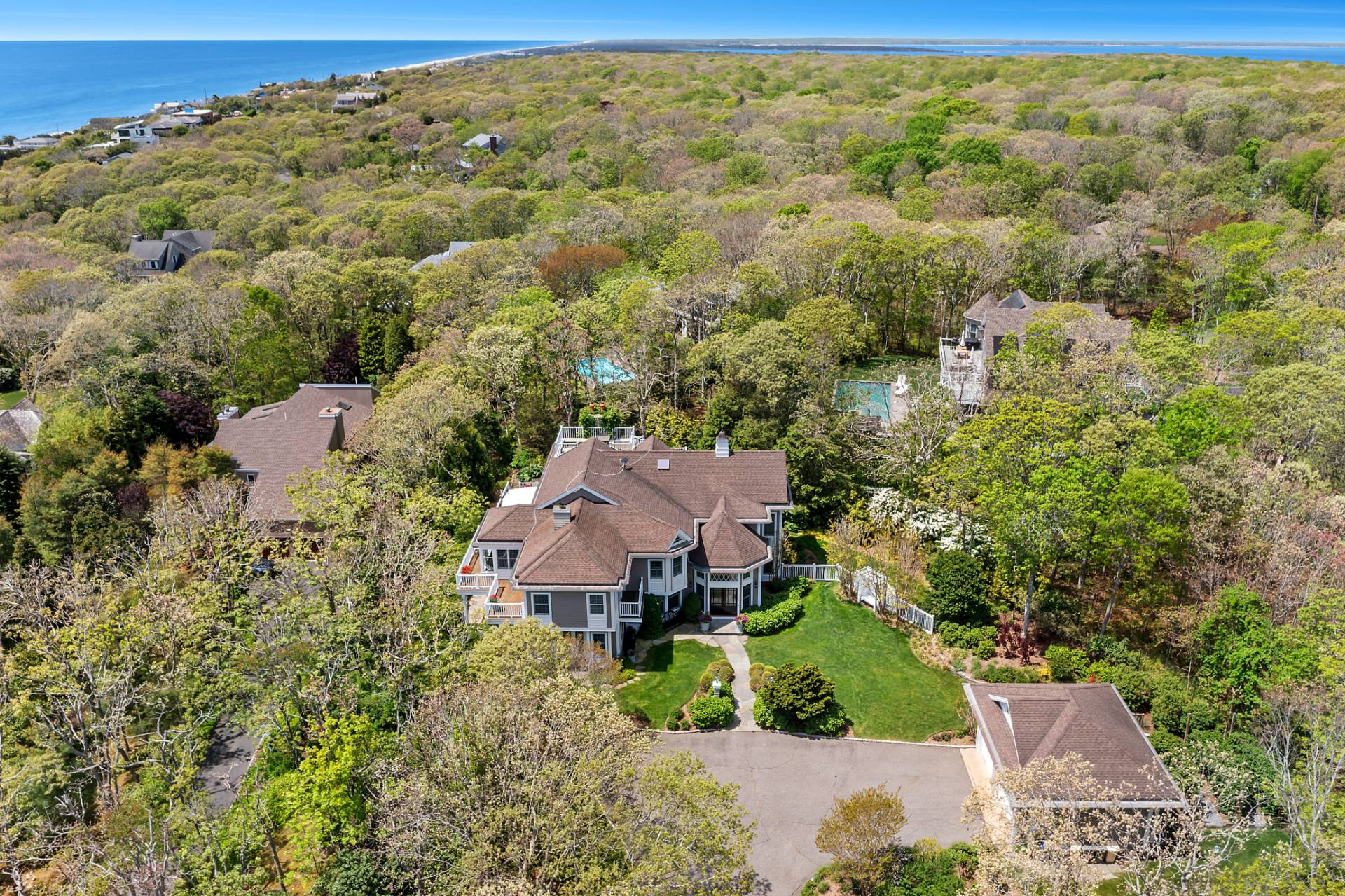 21 Tara Road Montauk, NY 11954 - Photo 36 of 37 an aerial view of a house with a yard
