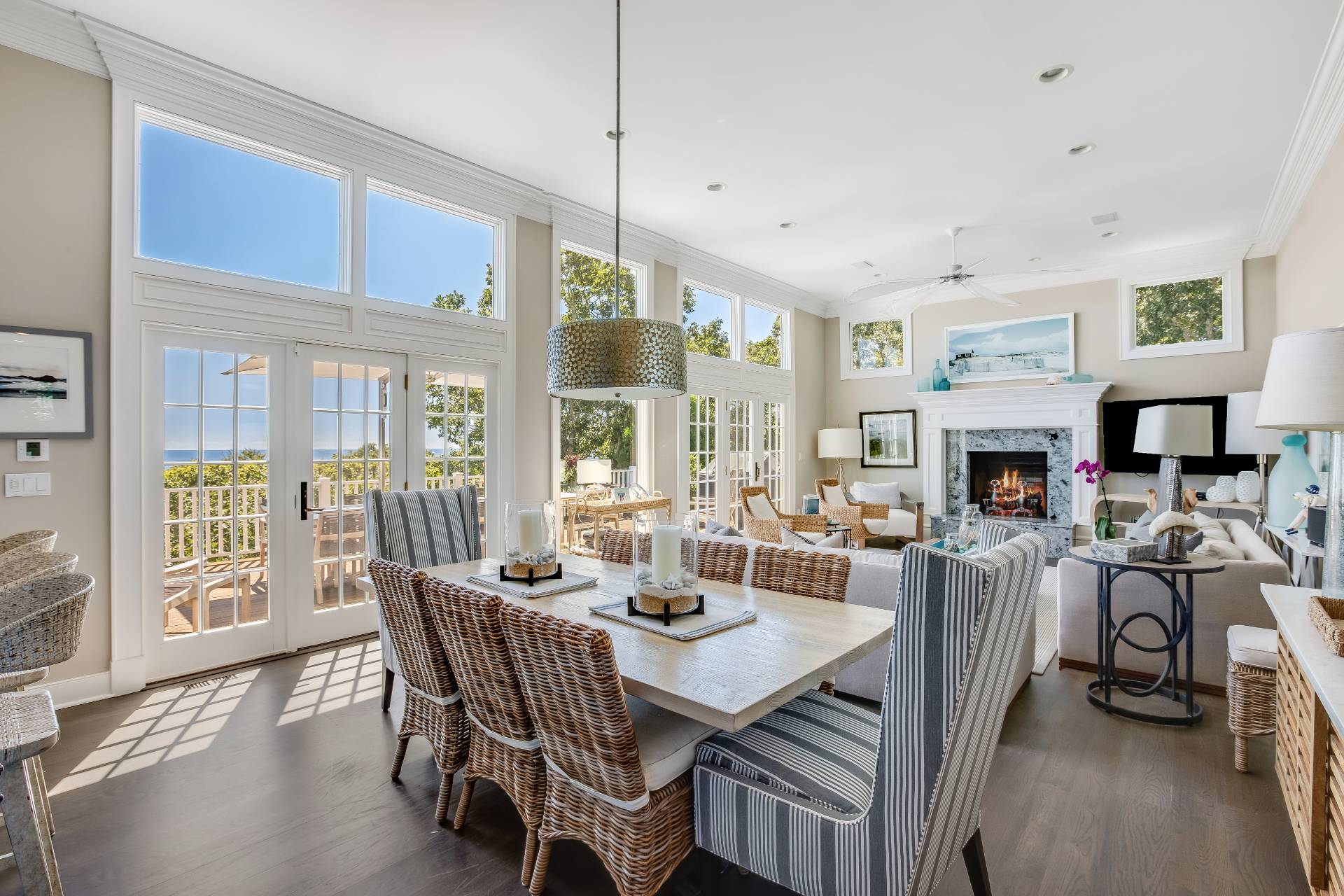 21 Tara Road Montauk, NY 11954 - Photo 7 of 37 a view of a dining room with furniture window and wooden floor