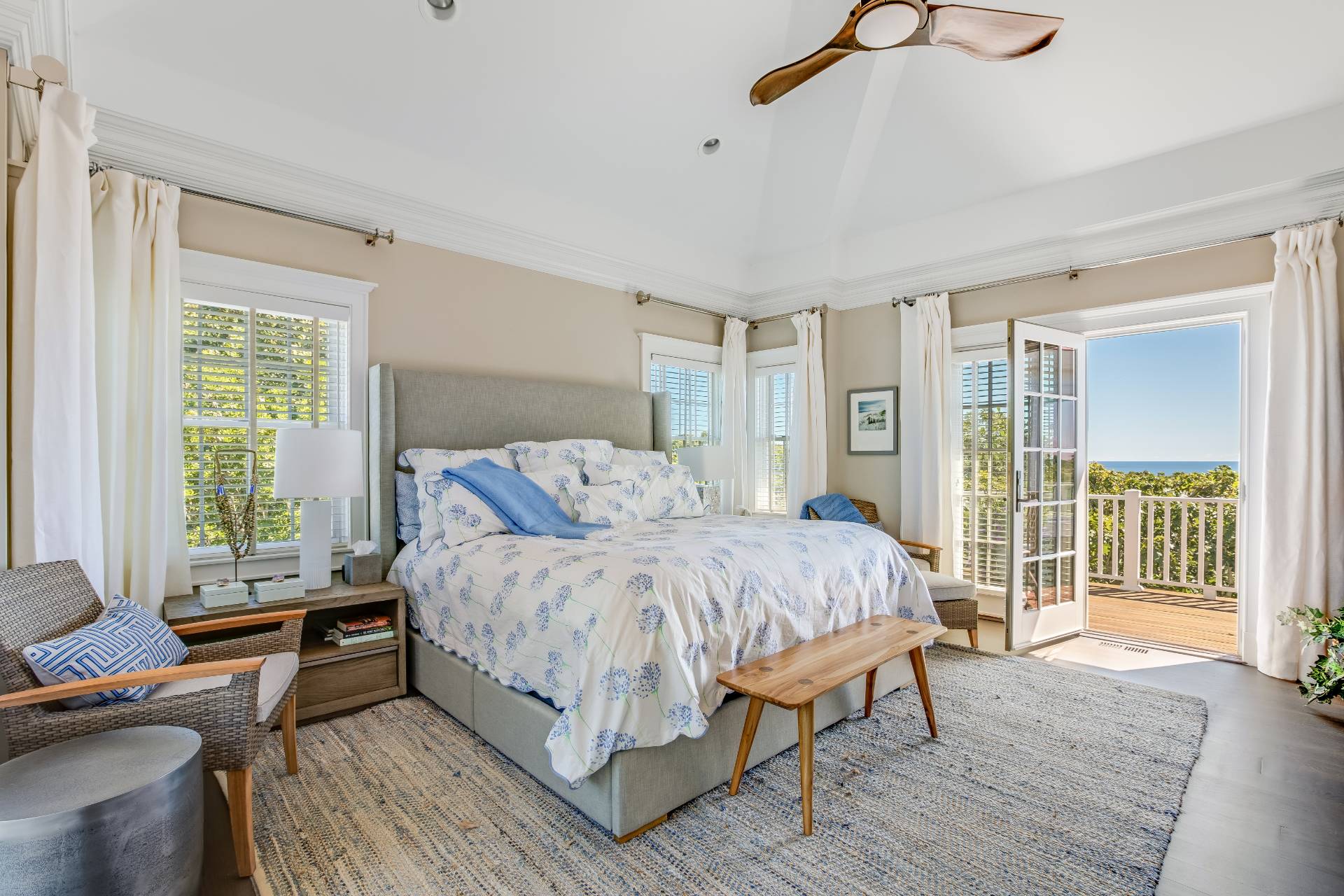 21 Tara Road Montauk, NY 11954 - Photo 9 of 37 a spacious bedroom with a bed and a couch