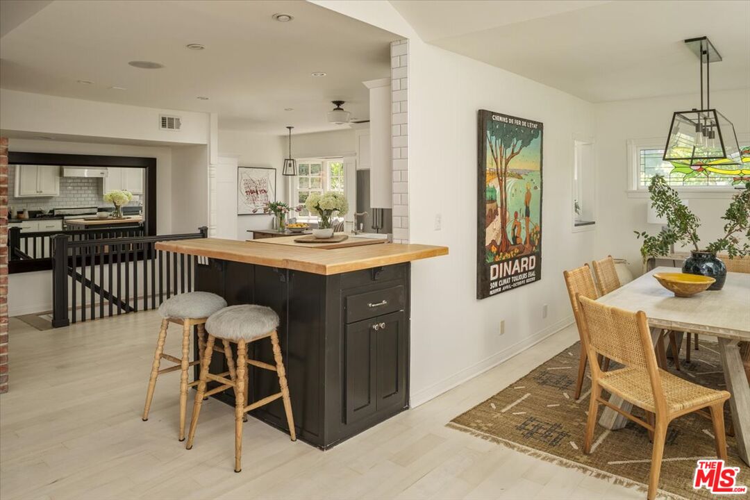 3983 Sunswept Drive Studio City, CA 91604 - Photo 13 of 53 a view of a dining room with furniture