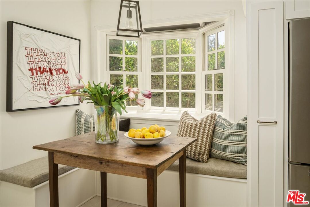 3983 Sunswept Drive Studio City, CA 91604 - Photo 18 of 53 a dining room with furniture and window