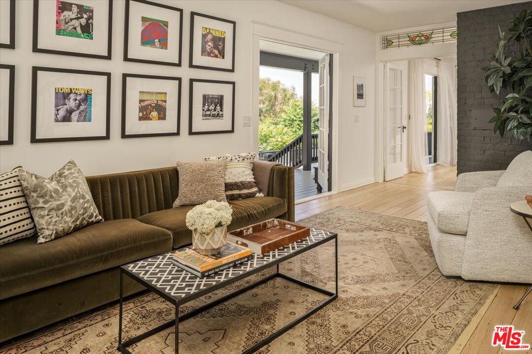 3983 Sunswept Drive Studio City, CA 91604 - Photo 29 of 53 a living room with furniture and a large window