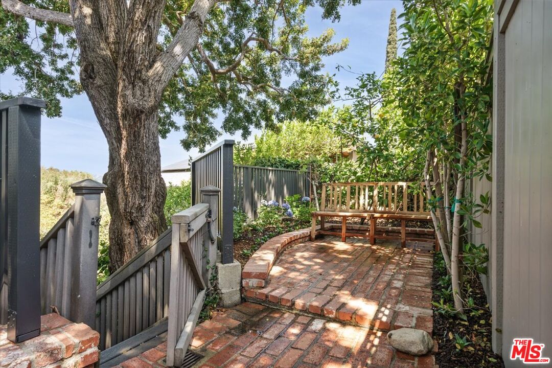 3983 Sunswept Drive Studio City, CA 91604 - Photo 3 of 53 a view of a chair and table in the patio