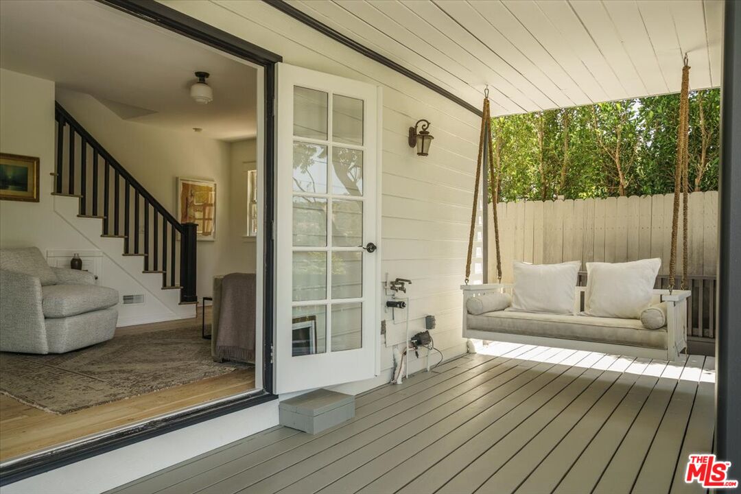 3983 Sunswept Drive Studio City, CA 91604 - Photo 40 of 53 a living room with furniture and a large window