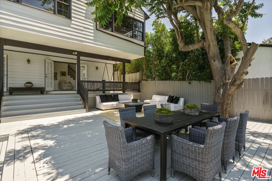 3983 Sunswept Drive Studio City, CA 91604 - Photo 42 of 53 a view of a dinning table and chairs in the patio