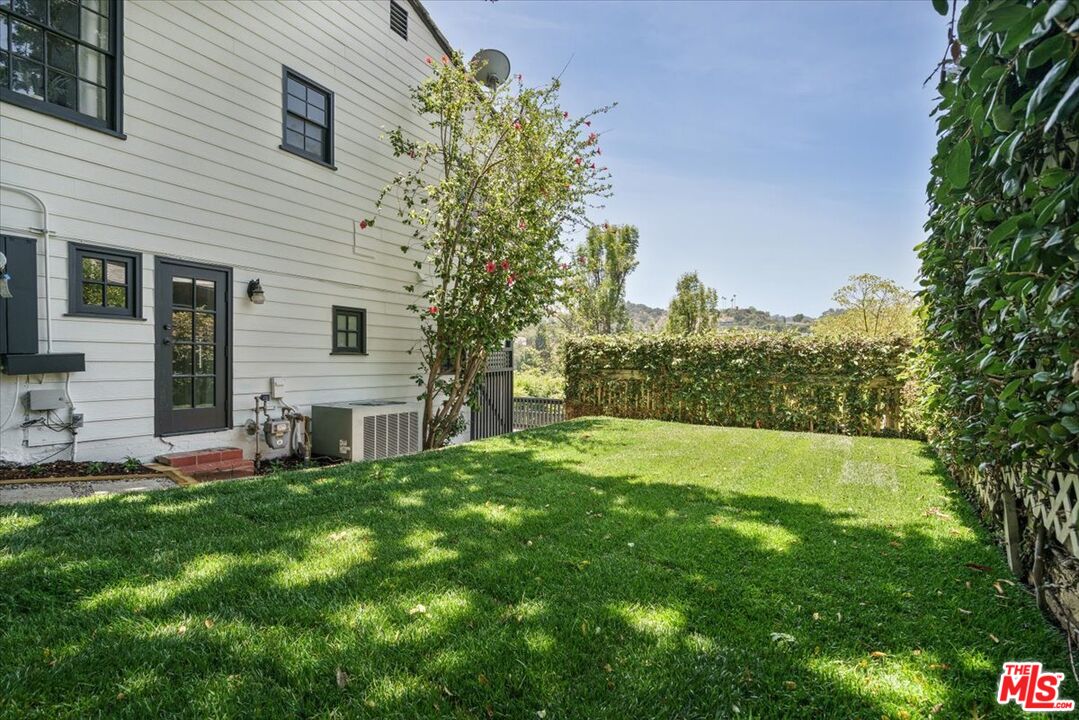 3983 Sunswept Drive Studio City, CA 91604 - Photo 48 of 53 a view of a house with a yard and sitting area