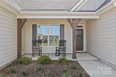 a front view of a house with a glass door