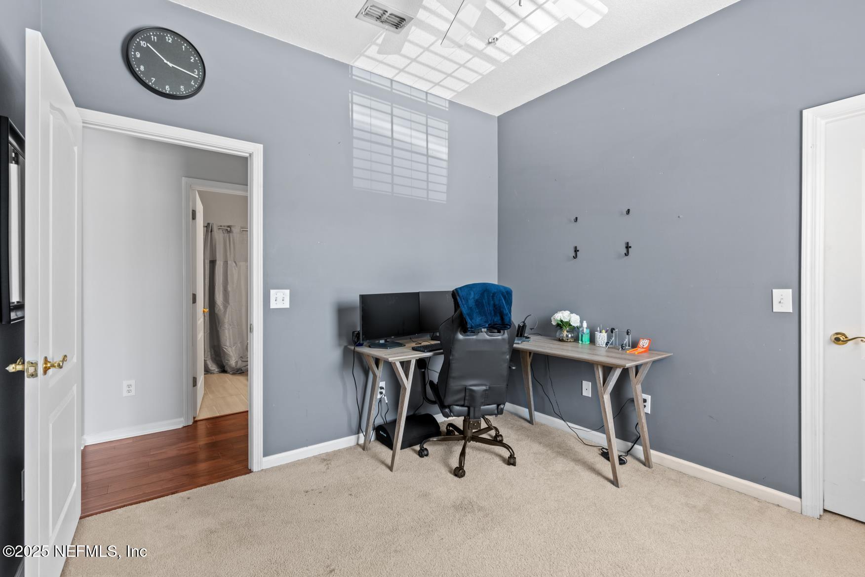 8601 Beach Boulevard, Unit 905 Jacksonville, FL 32216 - Photo 18 of 27 a view of a workspace with furniture