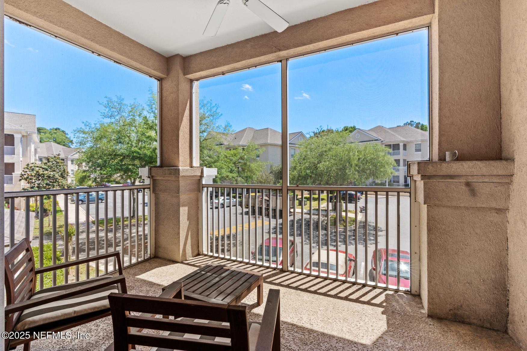 8601 Beach Boulevard, Unit 905 Jacksonville, FL 32216 - Photo 22 of 27 a view of a balcony with wooden floor