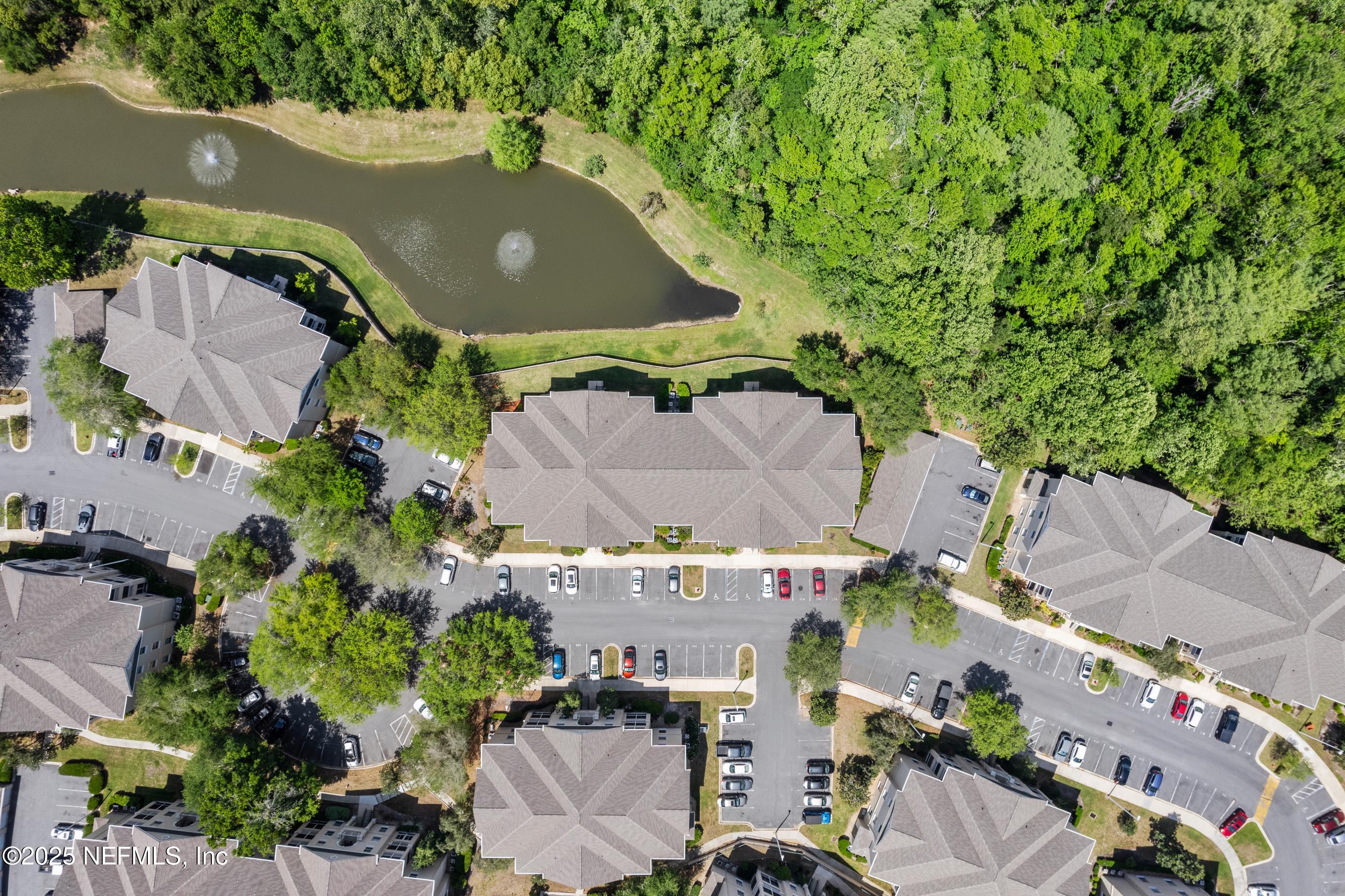 8601 Beach Boulevard, Unit 905 Jacksonville, FL 32216 - Photo 24 of 27 an aerial view of a house with a yard