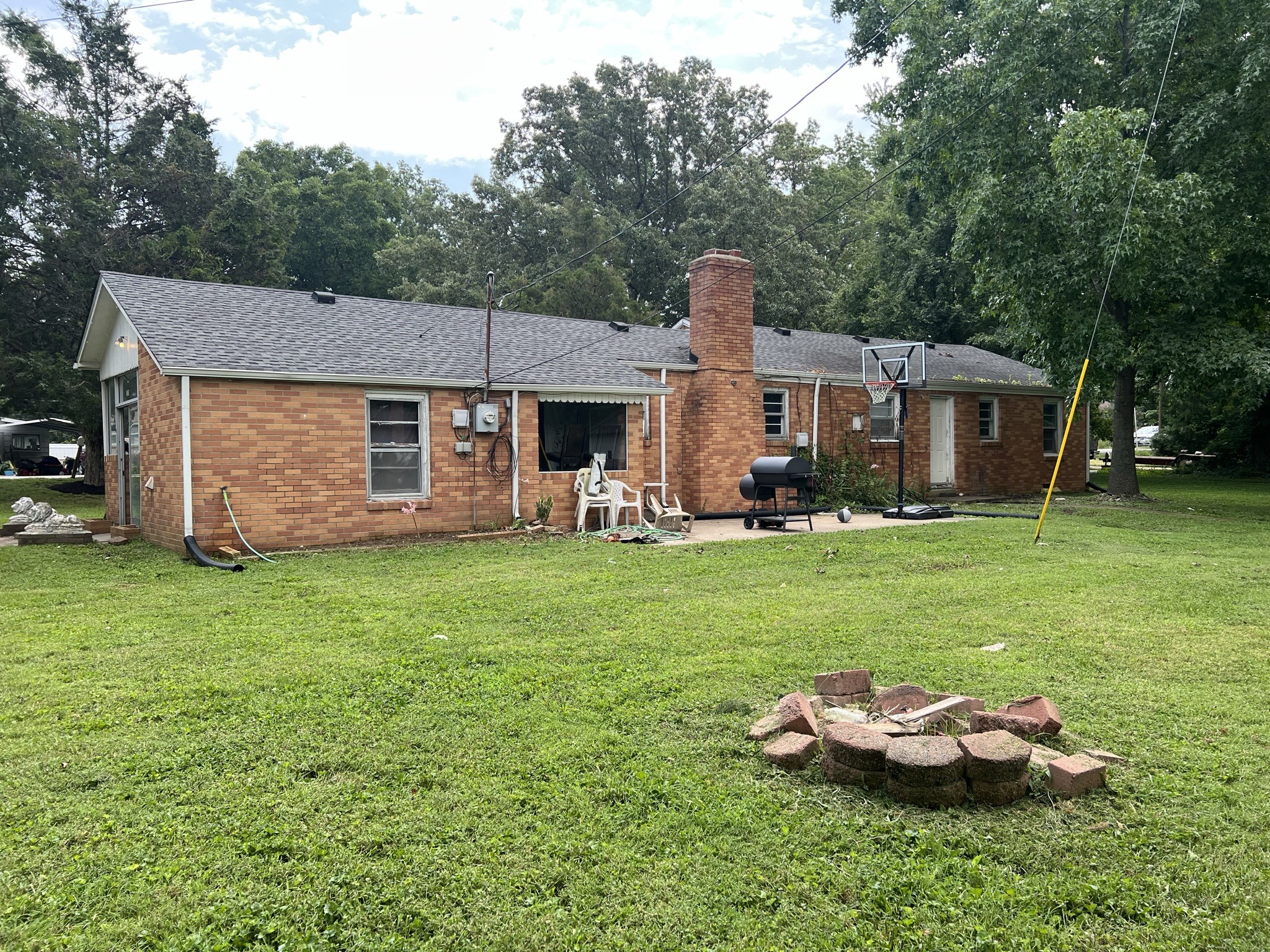 1400 Old Dover Road Clarksville, TN 37042 - Photo 11 of 65 a front view of a house with a garden and trees