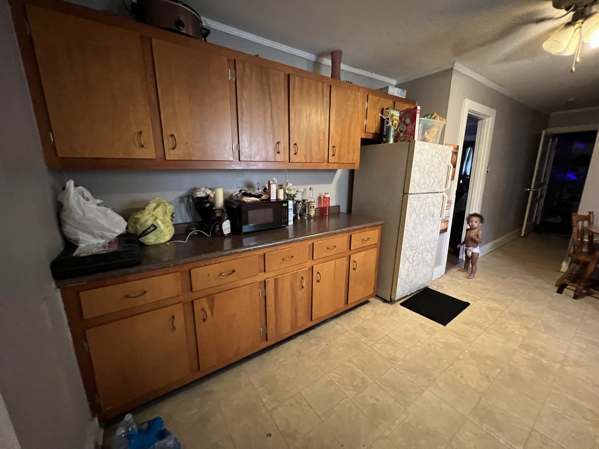 1400 Old Dover Road Clarksville, TN 37042 - Photo 16 of 65 a kitchen with stainless steel appliances granite countertop a refrigerator a sink and wooden cabinets
