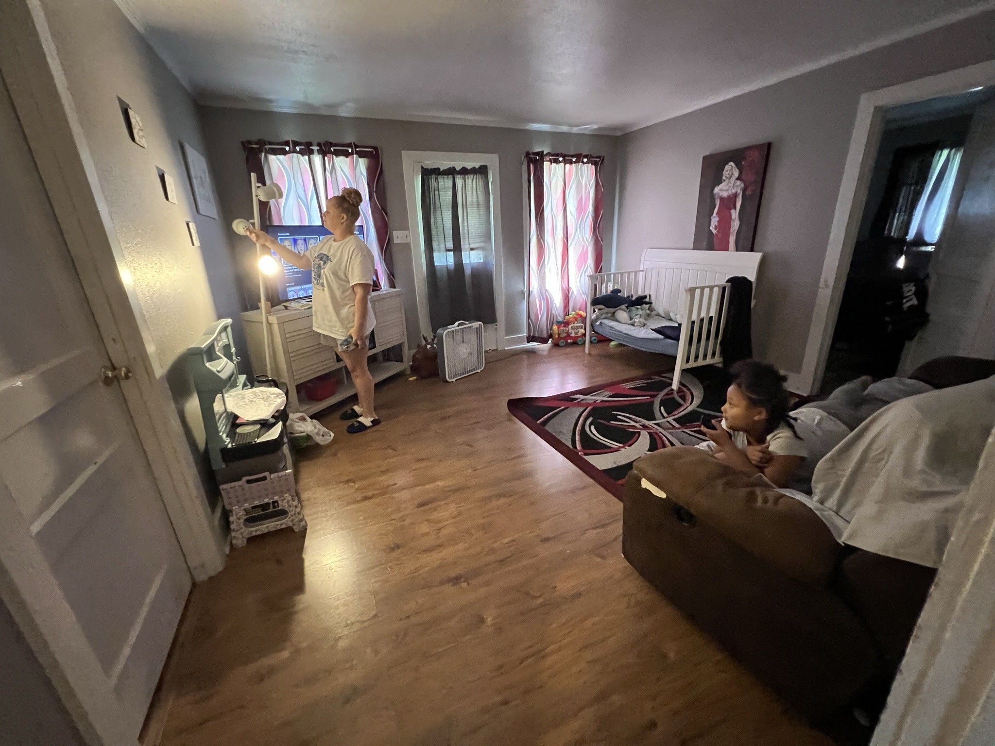 1400 Old Dover Road Clarksville, TN 37042 - Photo 19 of 65 a living room with furniture gym equipment and a large window