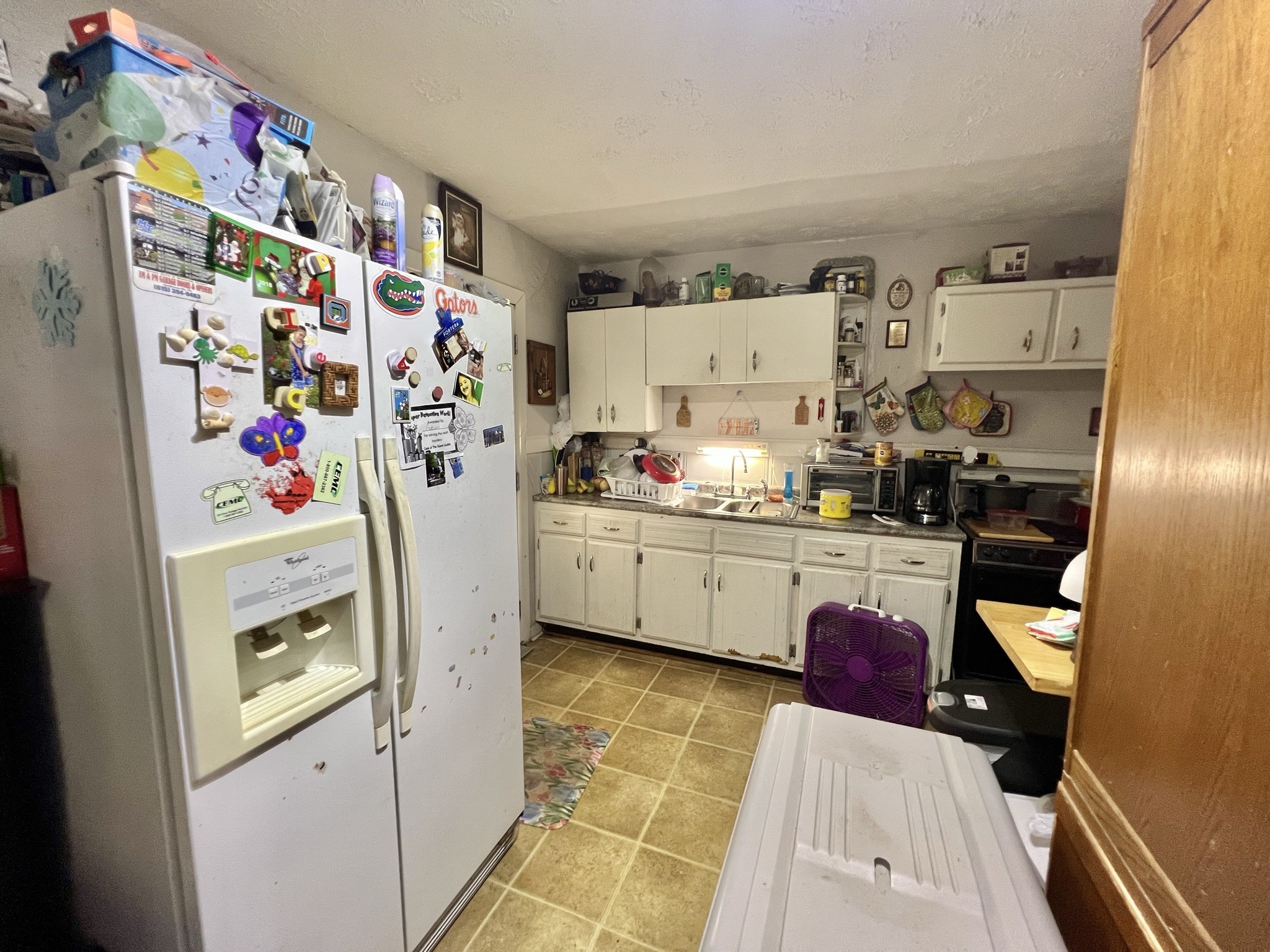 1400 Old Dover Road Clarksville, TN 37042 - Photo 41 of 65 a kitchen with refrigerator and cabinets