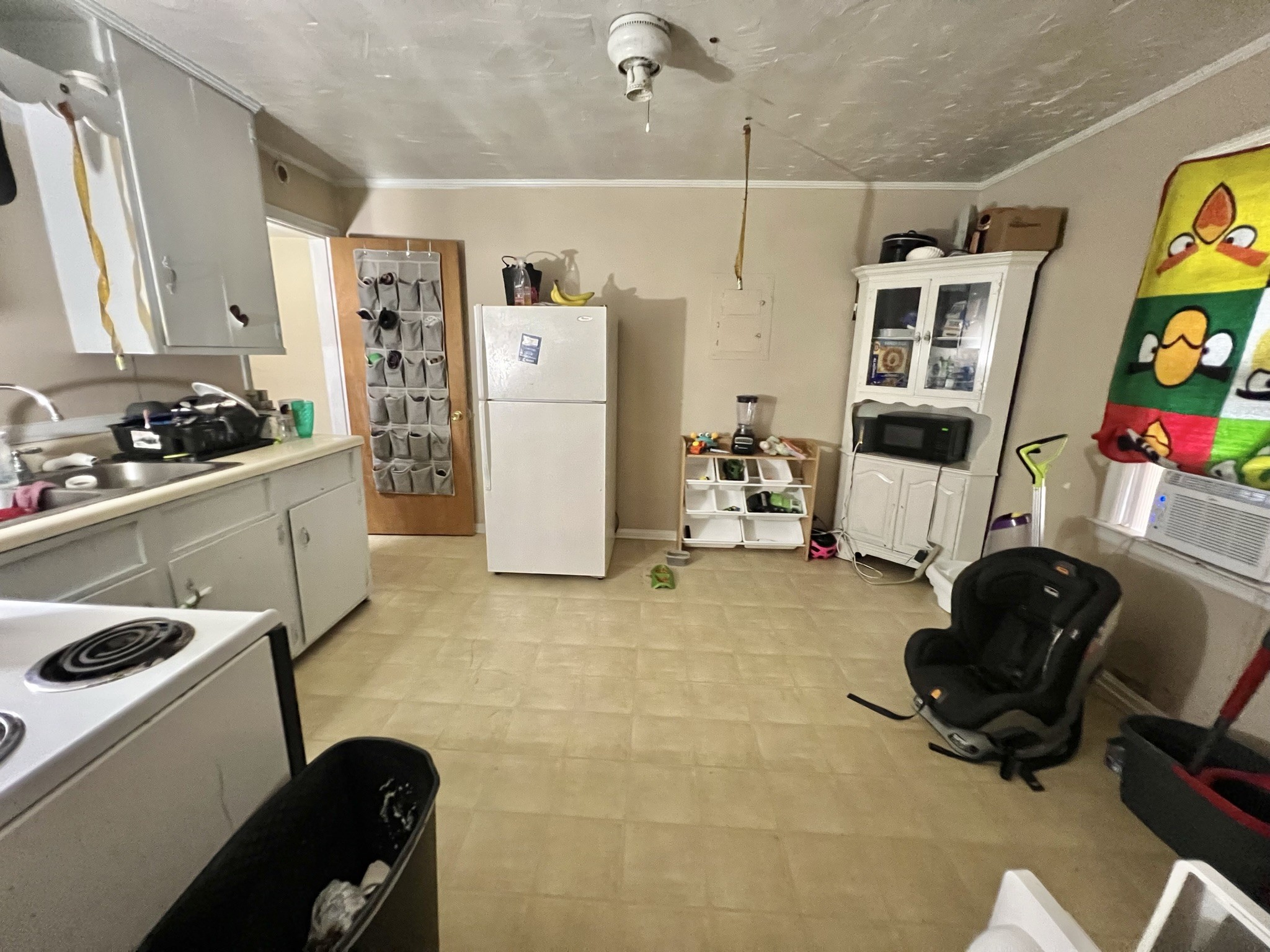 1400 Old Dover Road Clarksville, TN 37042 - Photo 52 of 65 a room with furniture a flat screen tv and a refrigerator