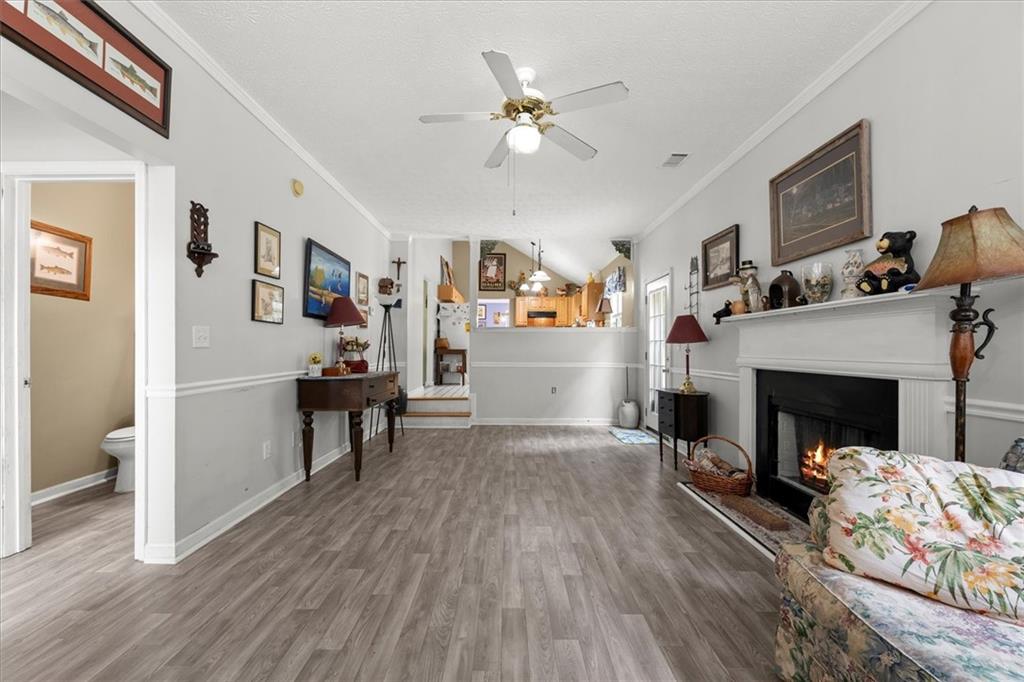 525 Michael Circle Monroe, GA 30655 - Photo 15 of 42 a living room with furniture and a fireplace
