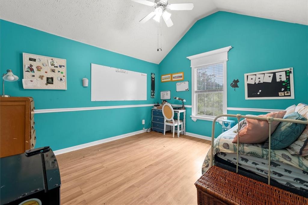 525 Michael Circle Monroe, GA 30655 - Photo 21 of 42 a room with furniture and a flat screen tv