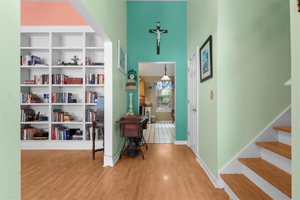 525 Michael Circle Monroe, GA 30655 - Photo 4 of 42 a view of a workspace area with furniture and wooden floor