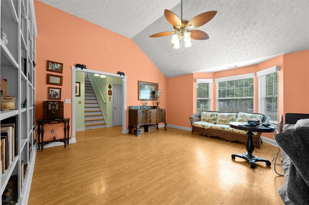 525 Michael Circle Monroe, GA 30655 - Photo 7 of 42 a view of a livingroom with workspace and a window