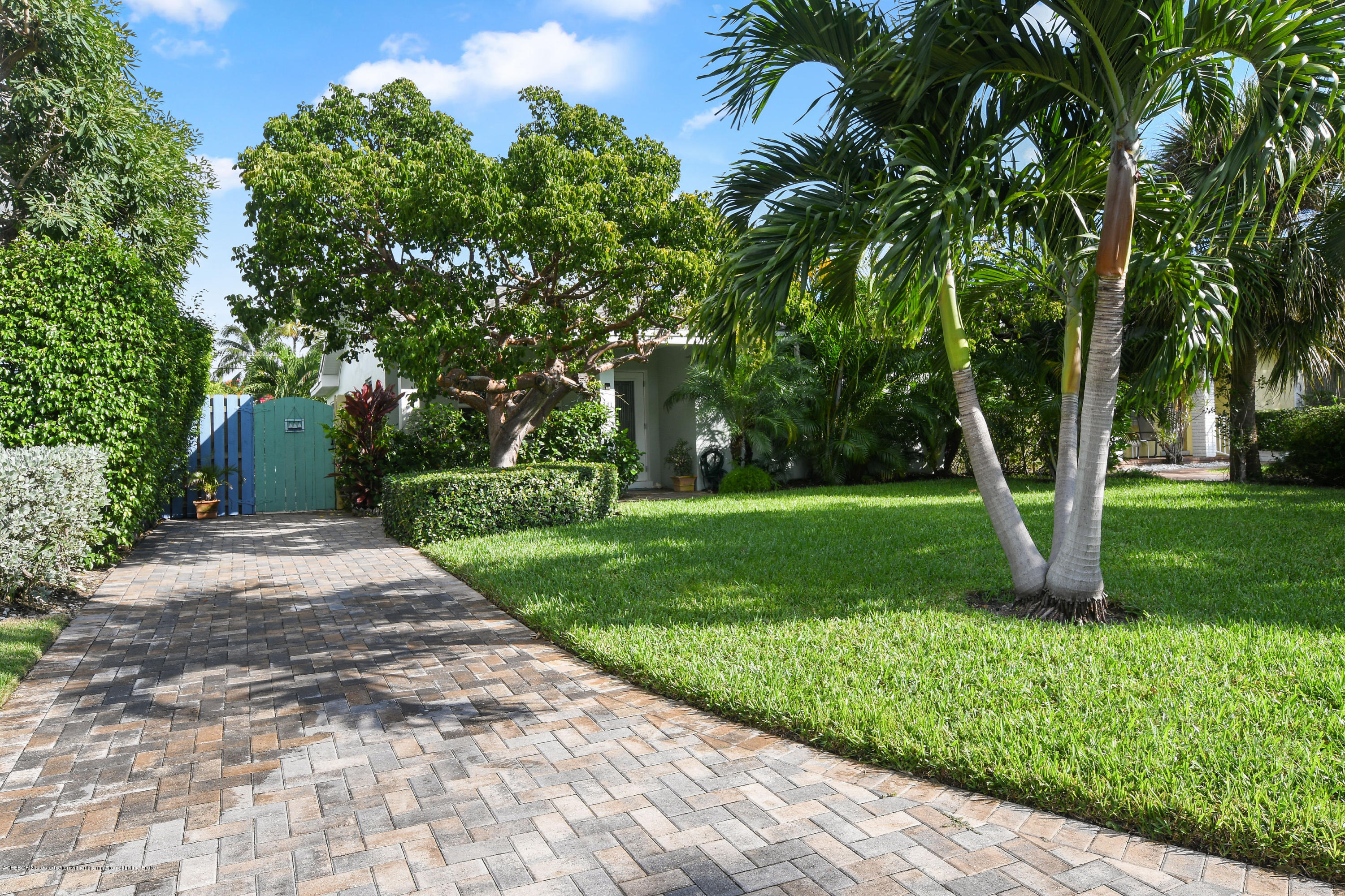 341 Murray Road West Palm Beach, FL 33405 - Photo 2 of 25 a view of a yard with palm trees