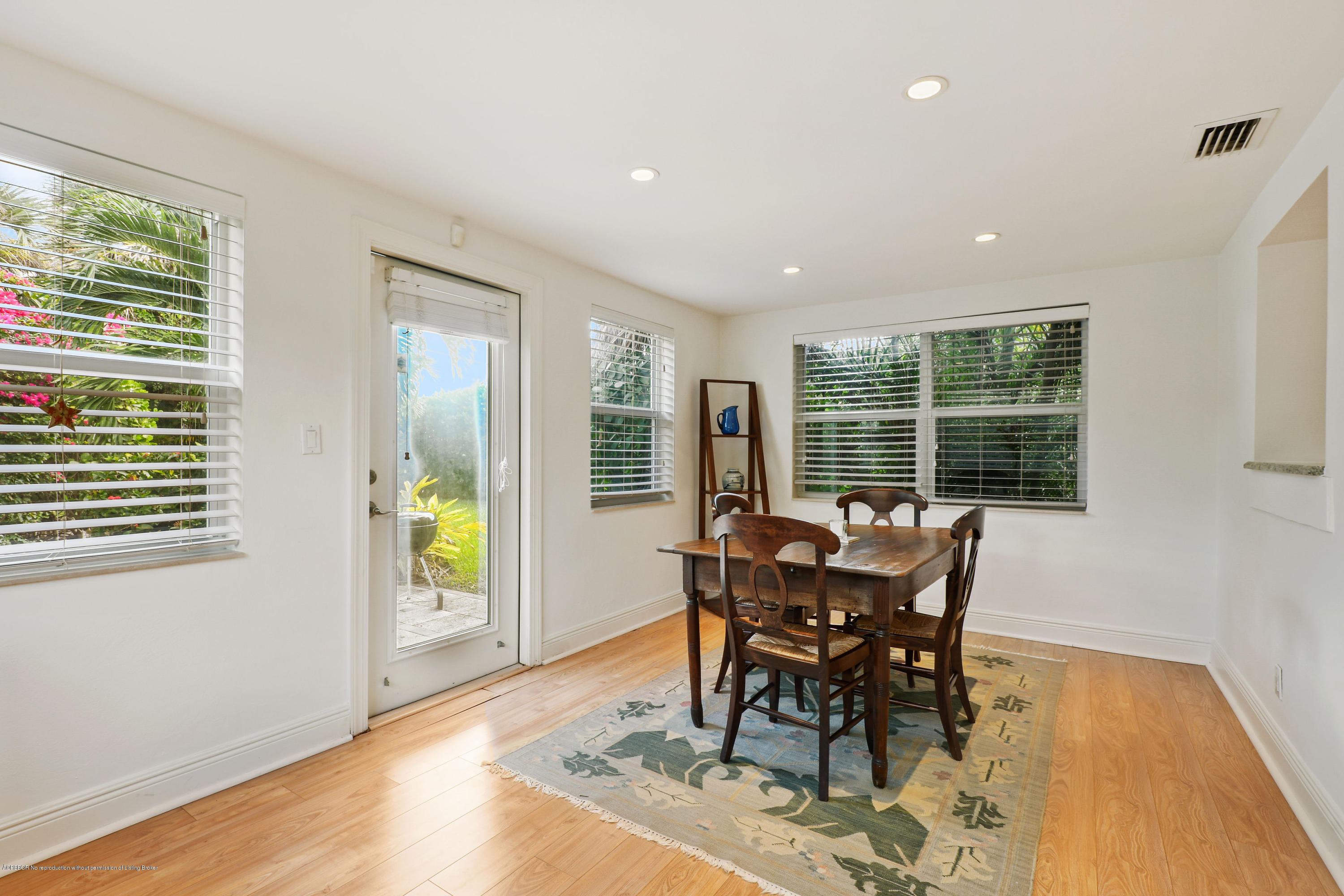 341 Murray Road West Palm Beach, FL 33405 - Photo 12 of 25 a dining room with furniture and wooden floor