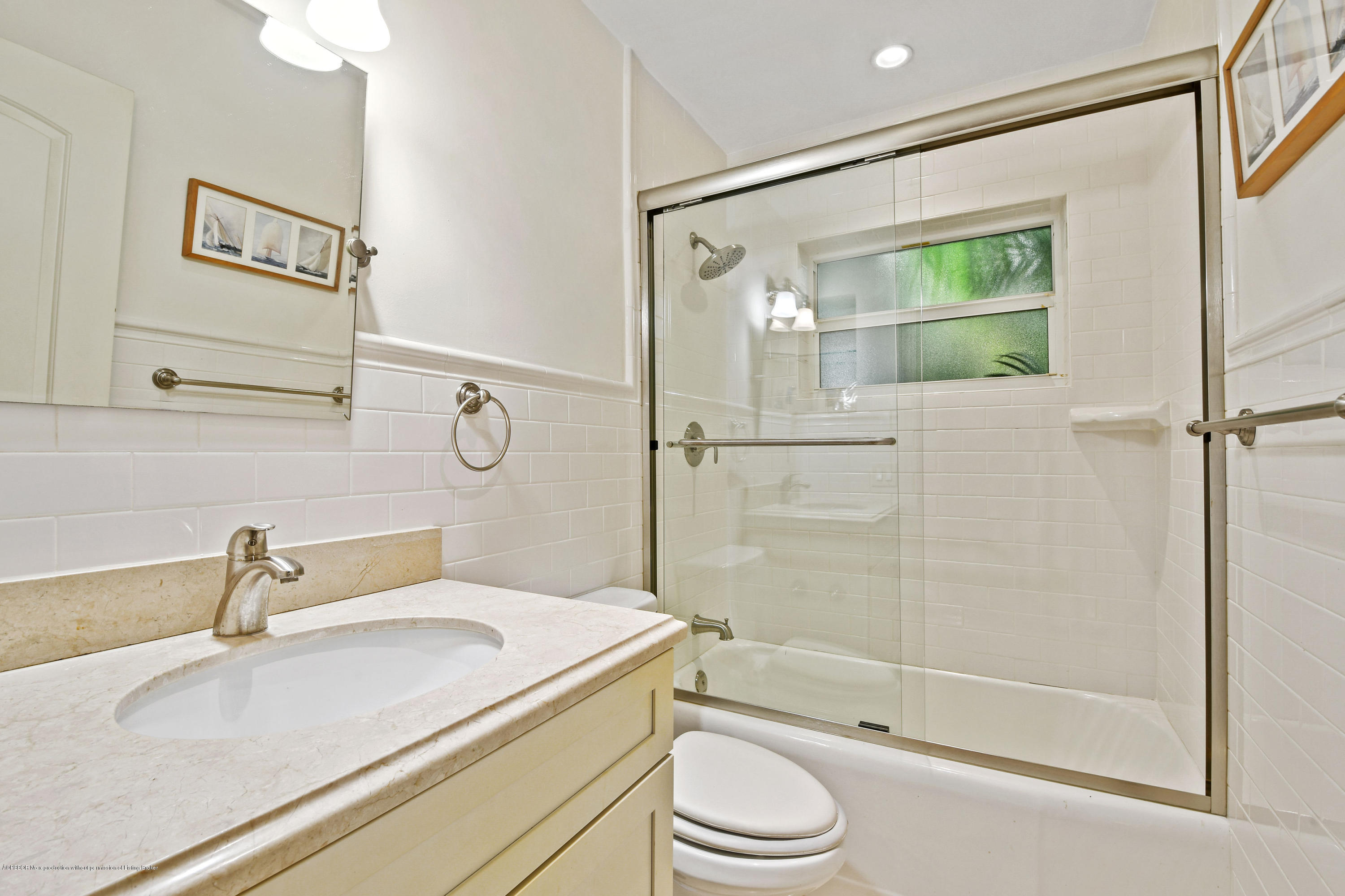 341 Murray Road West Palm Beach, FL 33405 - Photo 15 of 25 a bathroom with a sink toilet and shower