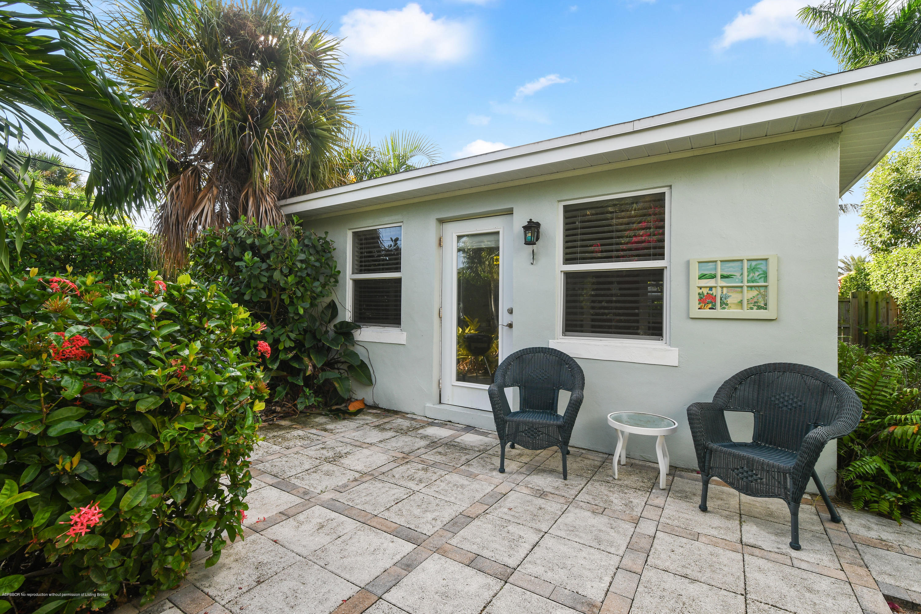 341 Murray Road West Palm Beach, FL 33405 - Photo 18 of 25 a backyard of a house with seating space