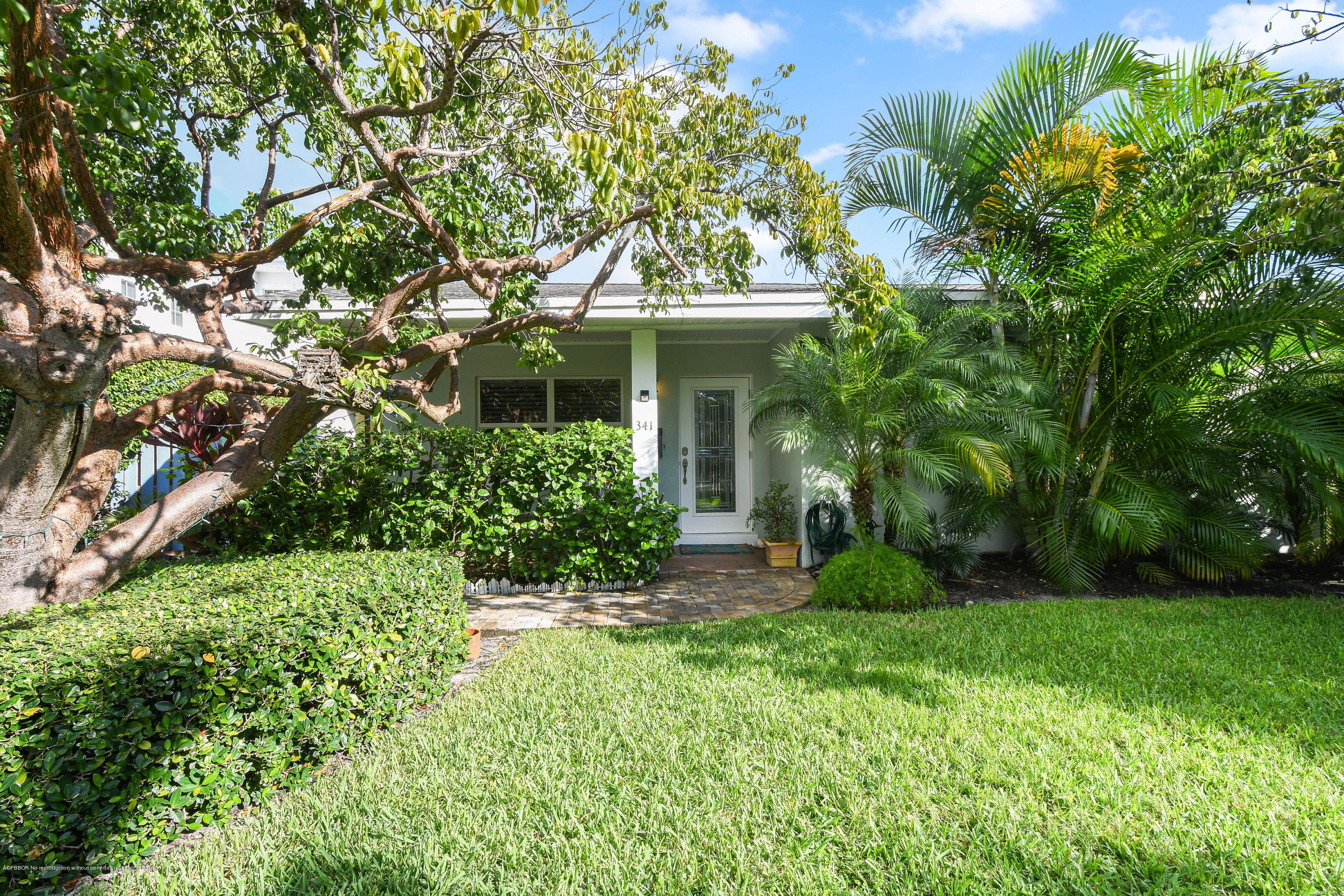 341 Murray Road West Palm Beach, FL 33405 - Photo 3 of 25 a view of a house with a yard