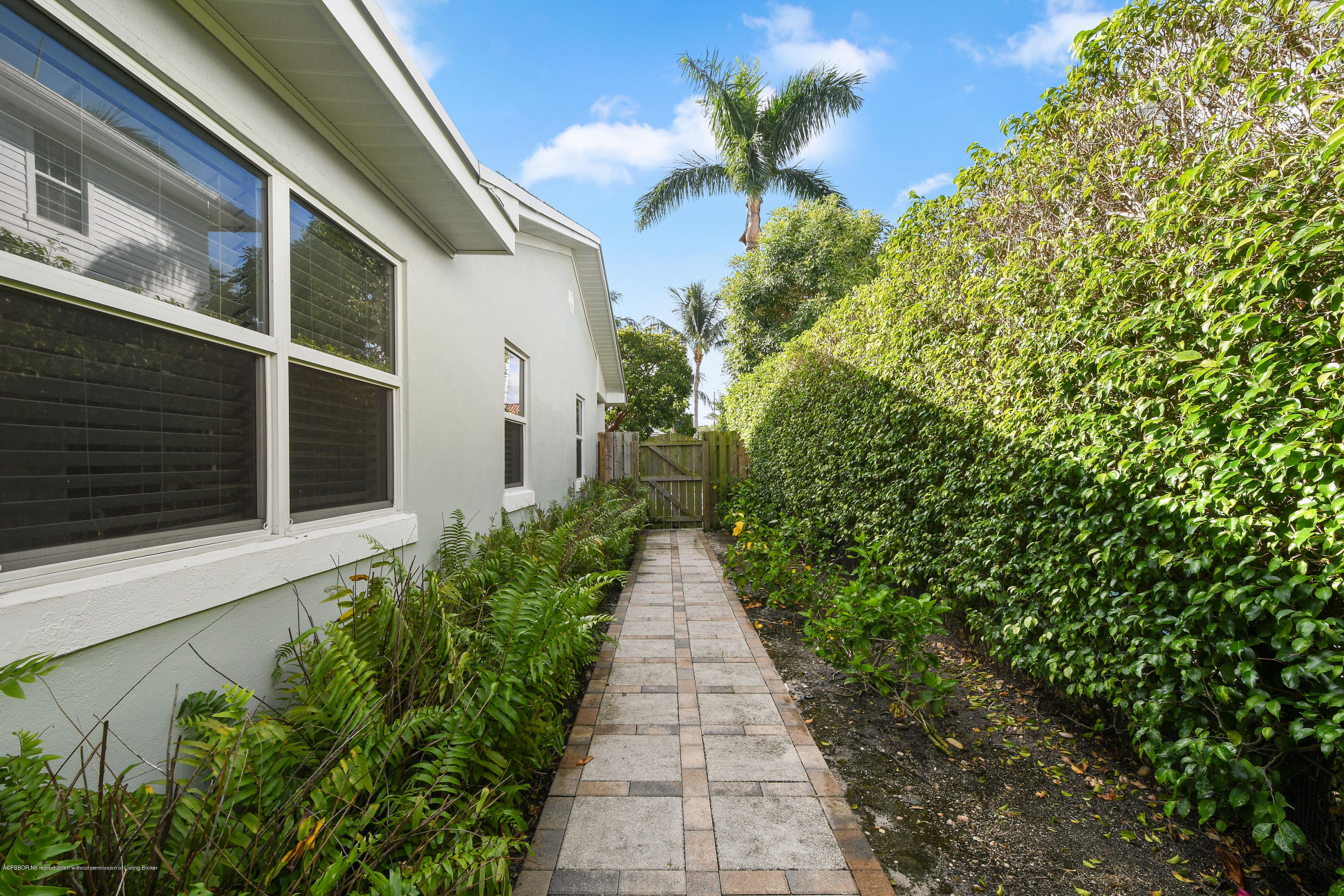 341 Murray Road West Palm Beach, FL 33405 - Photo 25 of 25 a pathway of a house with a yard