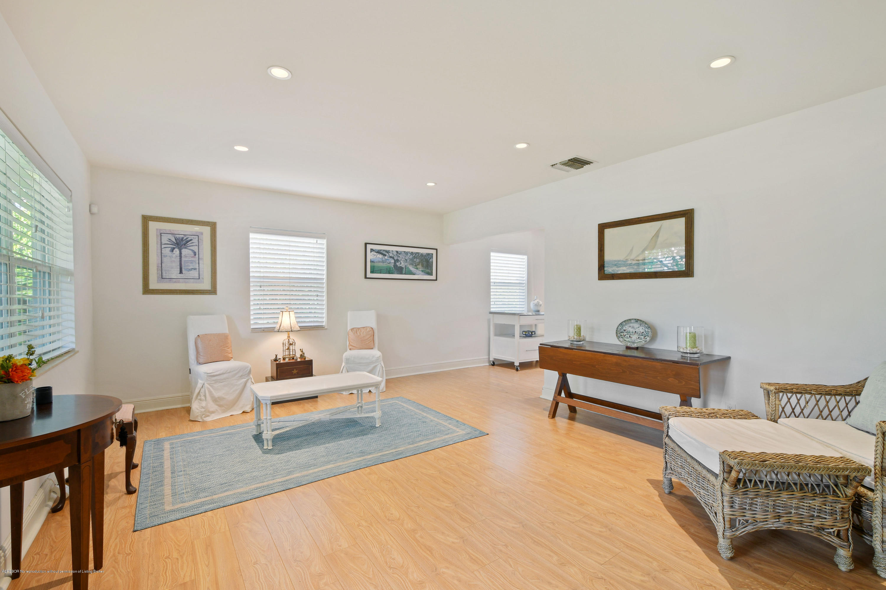 341 Murray Road West Palm Beach, FL 33405 - Photo 5 of 25 a living room with furniture and a lamp