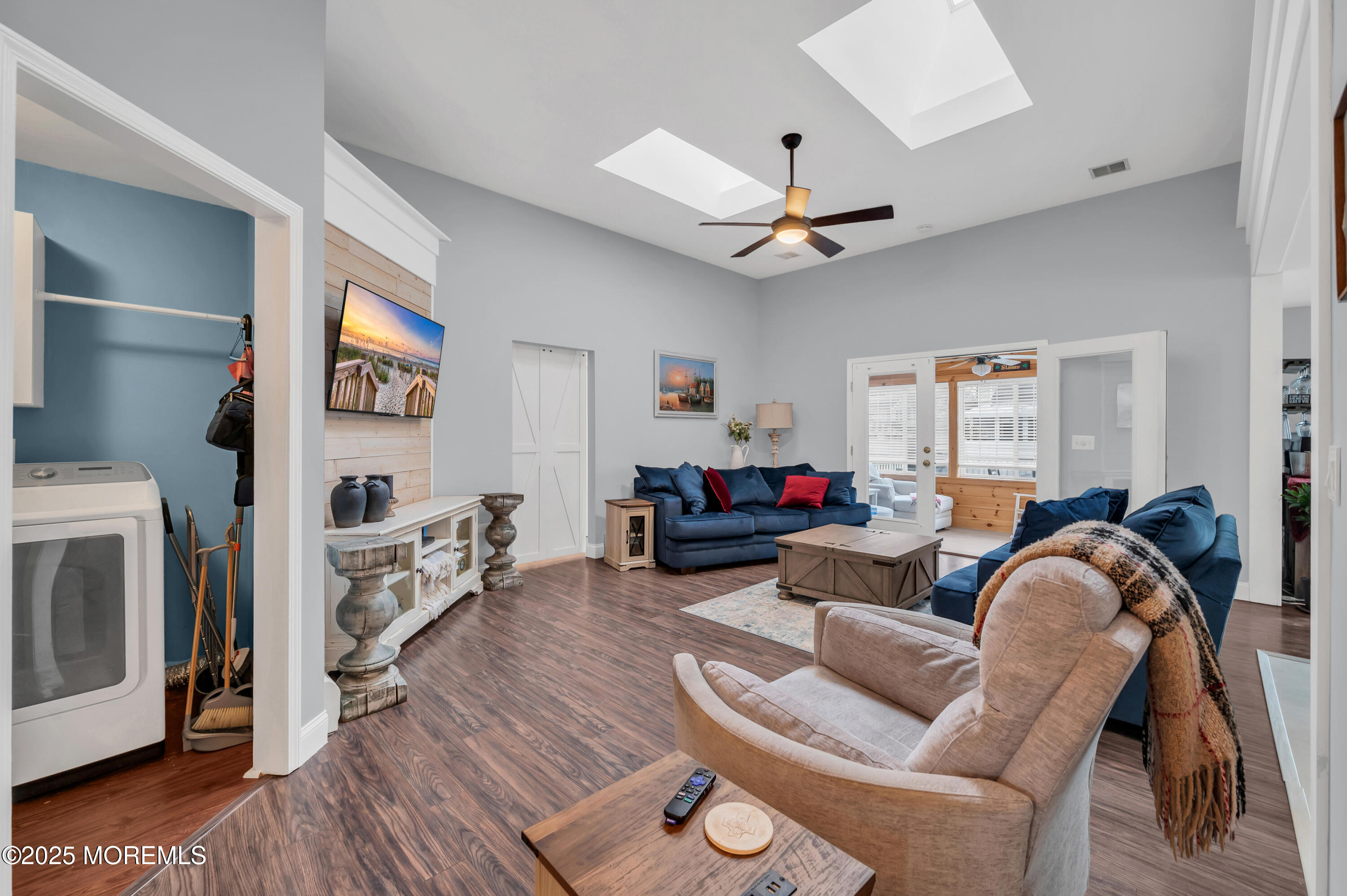 141 Cruise Road Manahawkin, NJ 08050 - Photo 5 of 37 a living room with furniture and a fireplace
