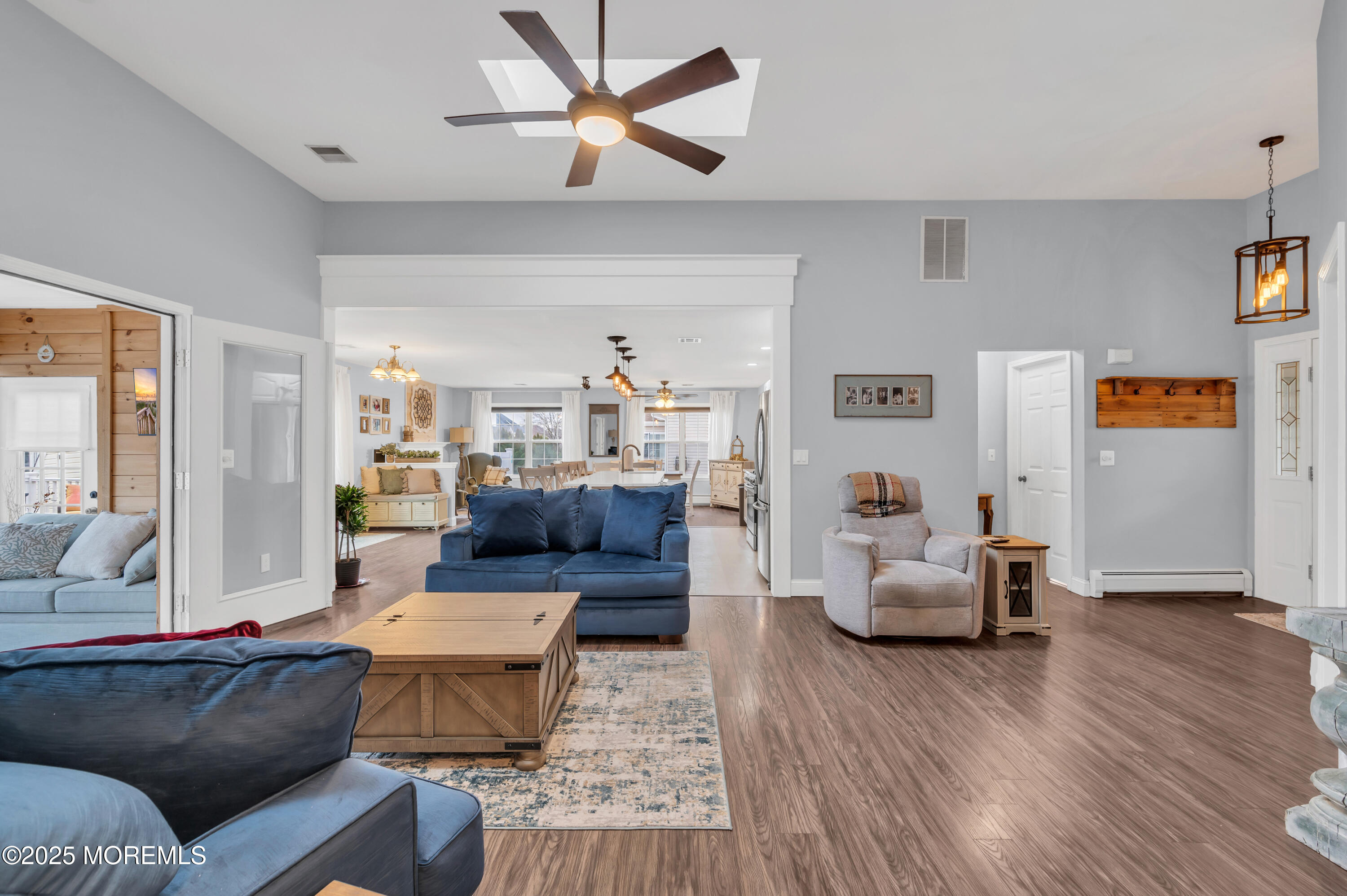 141 Cruise Road Manahawkin, NJ 08050 - Photo 6 of 37 a living room with furniture and wooden floor