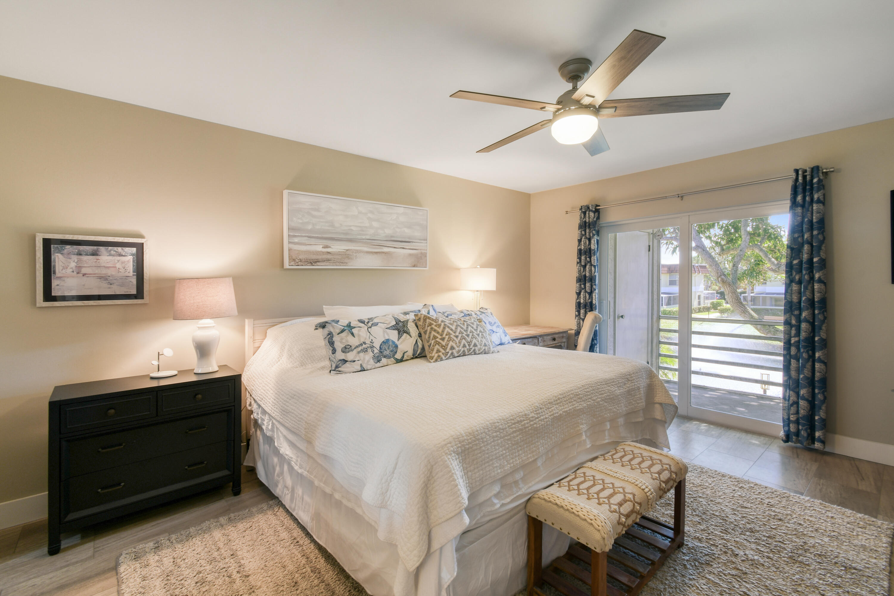 717 Highway 1, Unit 508 Jupiter, FL 33477 - Photo 20 of 66 a bedroom with a bed and a chandelier