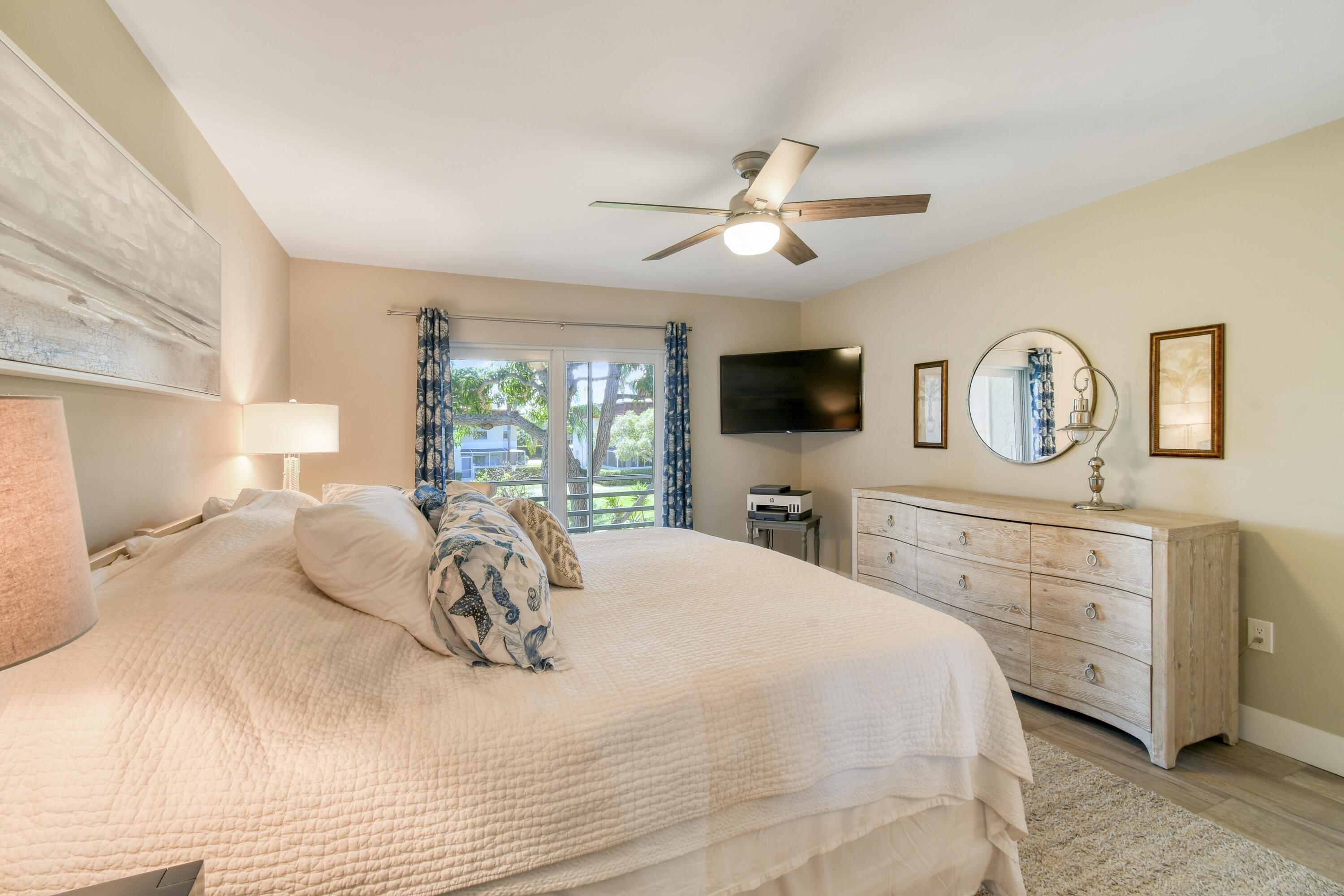 717 Highway 1, Unit 508 Jupiter, FL 33477 - Photo 21 of 66 a bedroom with a bed and a flat screen tv