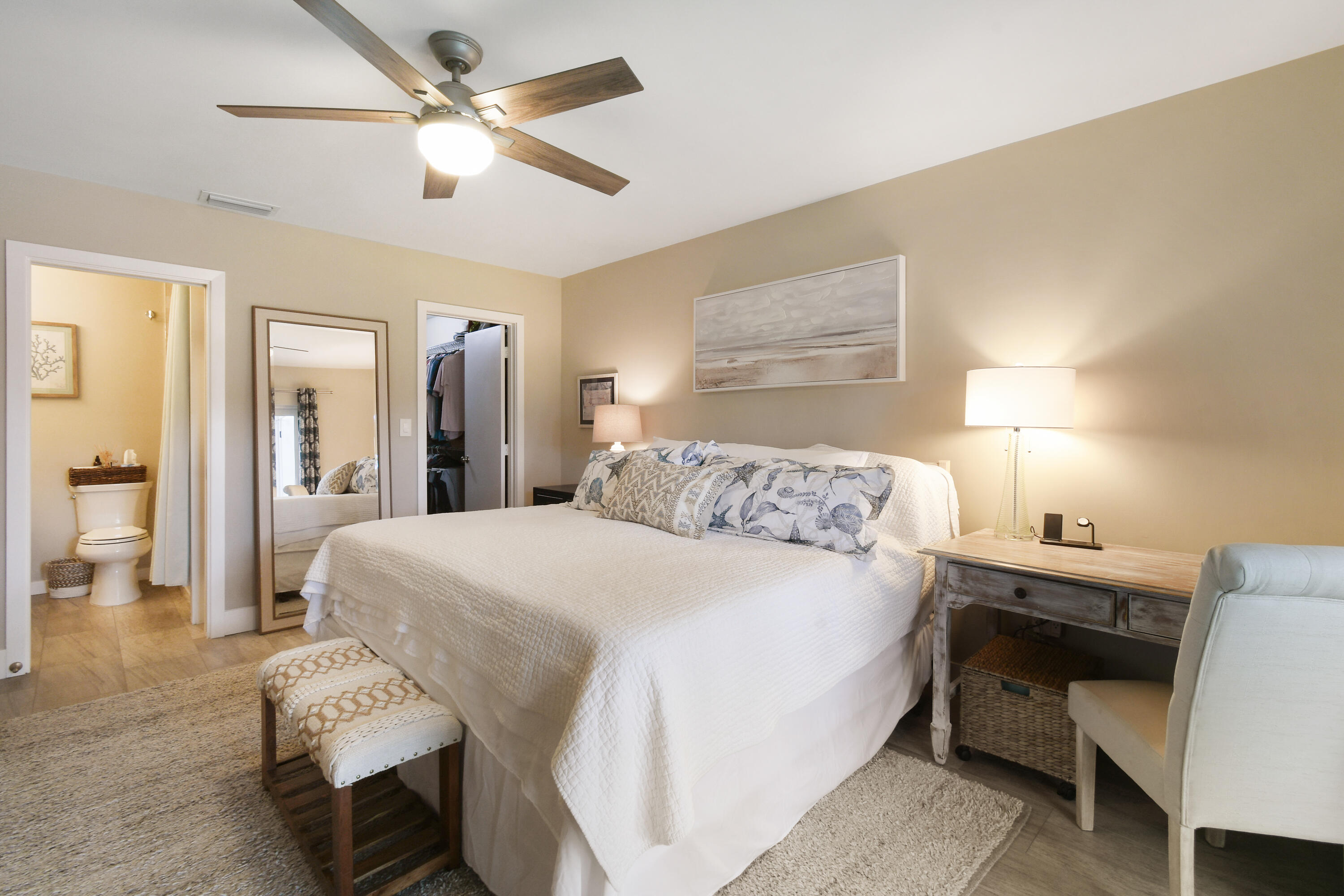 717 Highway 1, Unit 508 Jupiter, FL 33477 - Photo 22 of 66 a spacious bedroom with a bed and a chandelier